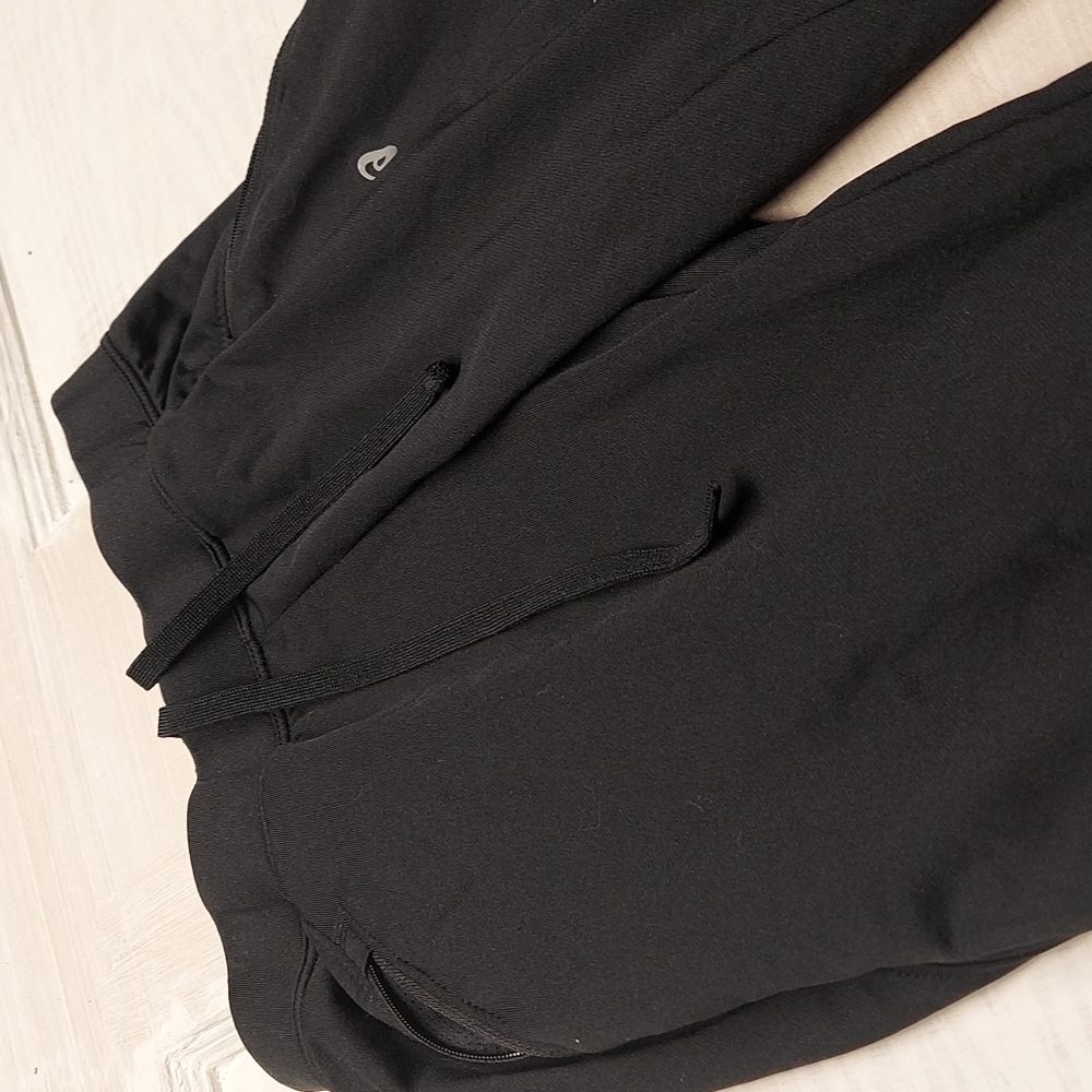 ASICS exercise or running pants.
